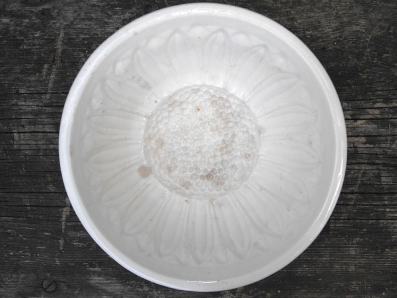 A 1903 Registered W.H.L. Ceramic Jelly Mould in the Form of a Sunflower