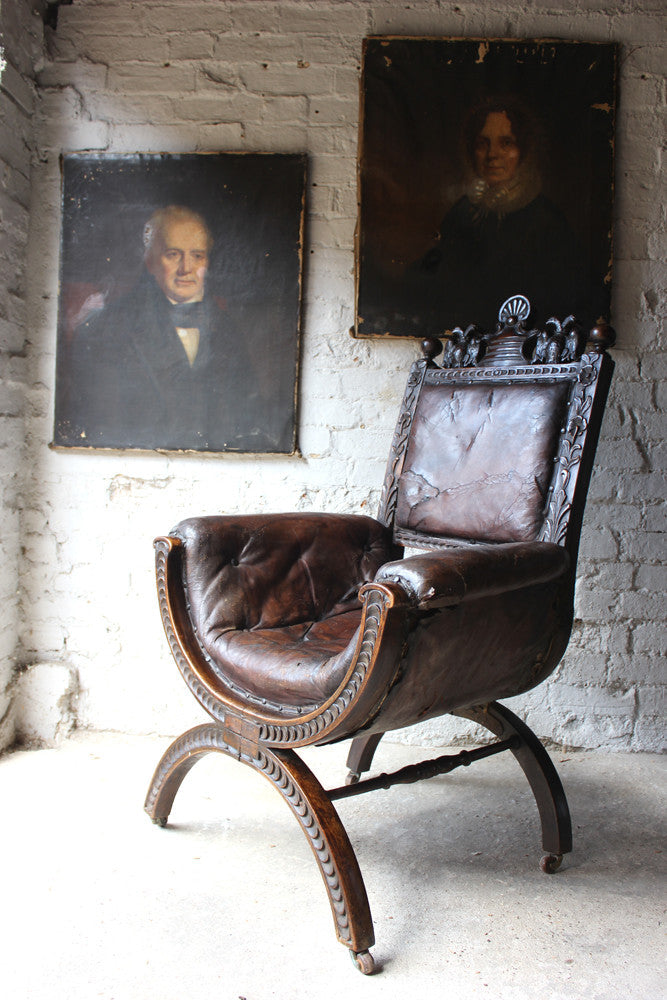 A Good 19thC Carved Oak & Leather Upholstered Savonarola Armchair