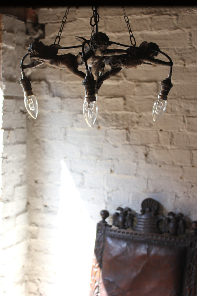 A Fabulous c.1890 Centre Light in the Form of Four Putti