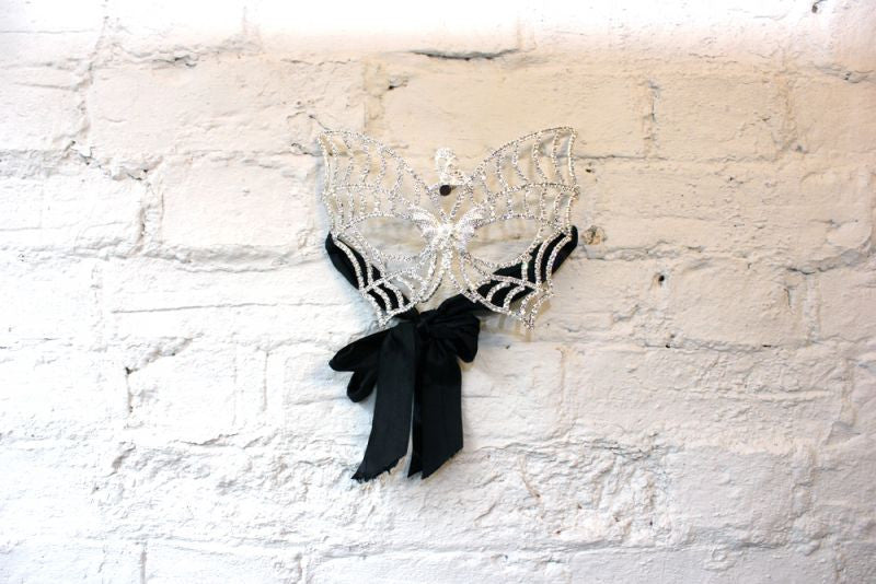 A Good Quality Masquerade Ball Mask in the Form of Butterfly Wings with Skull Decoration