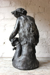 A Beautiful George III Period Lead Garden Ornament Cast as a Bacchanalian Putto