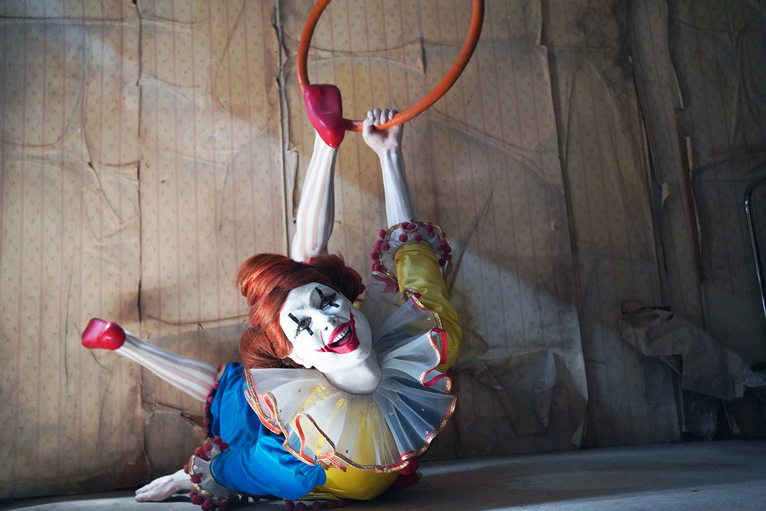 A 20thC Lifesize Painted Plaster & Silk Theatre Prop Model of an Acrobatic Clown by Mark Thompson