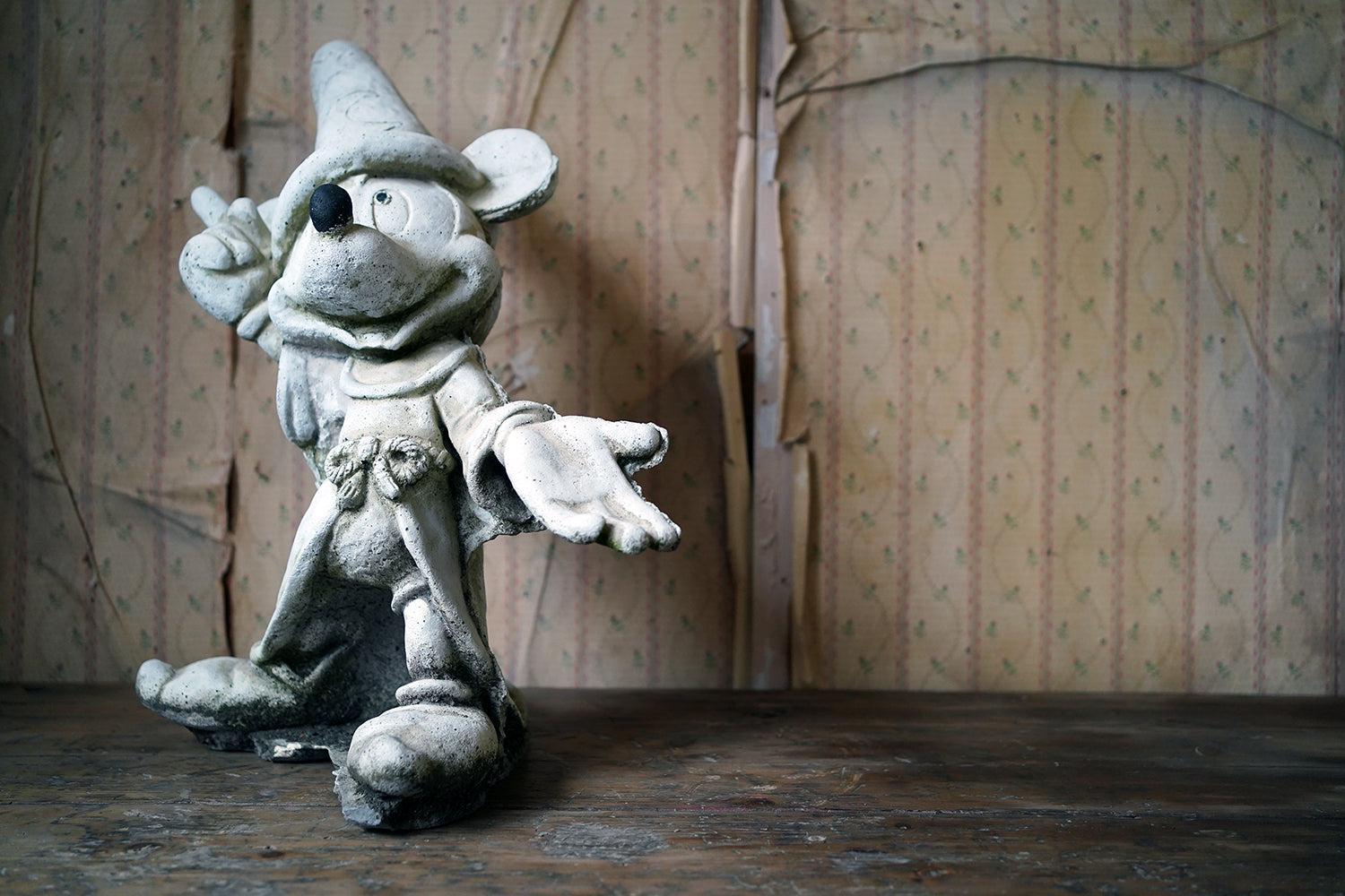 A 20thC Stone Figure of Mickey Mouse; The Sorcerer's Apprentice in Fantasia