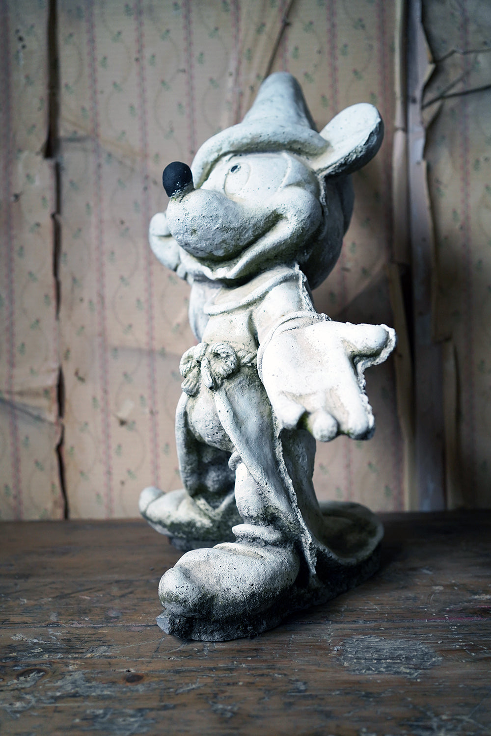 A 20thC Stone Figure of Mickey Mouse; The Sorcerer's Apprentice in Fantasia