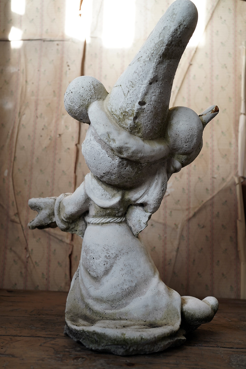 A 20thC Stone Figure of Mickey Mouse; The Sorcerer's Apprentice in Fantasia