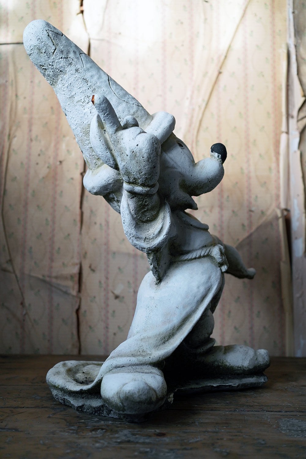 A 20thC Stone Figure of Mickey Mouse; The Sorcerer's Apprentice in Fantasia