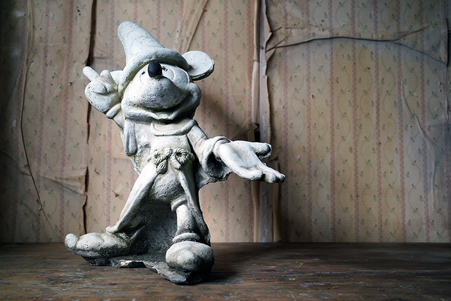 A 20thC Stone Figure of Mickey Mouse; The Sorcerer's Apprentice in Fantasia