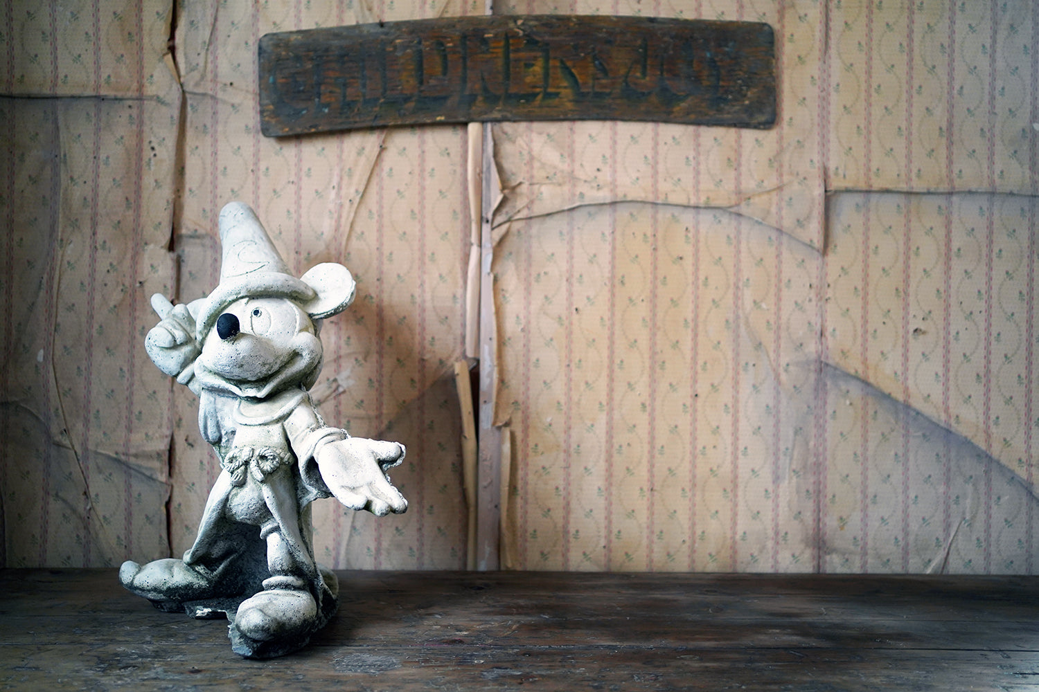A 20thC Stone Figure of Mickey Mouse; The Sorcerer's Apprentice in Fantasia