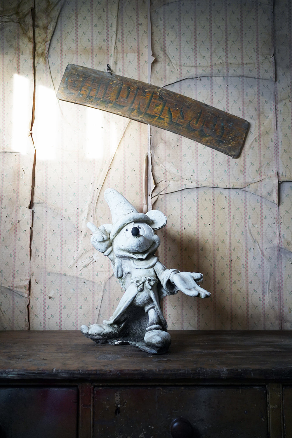 A 20thC Stone Figure of Mickey Mouse; The Sorcerer's Apprentice in Fantasia