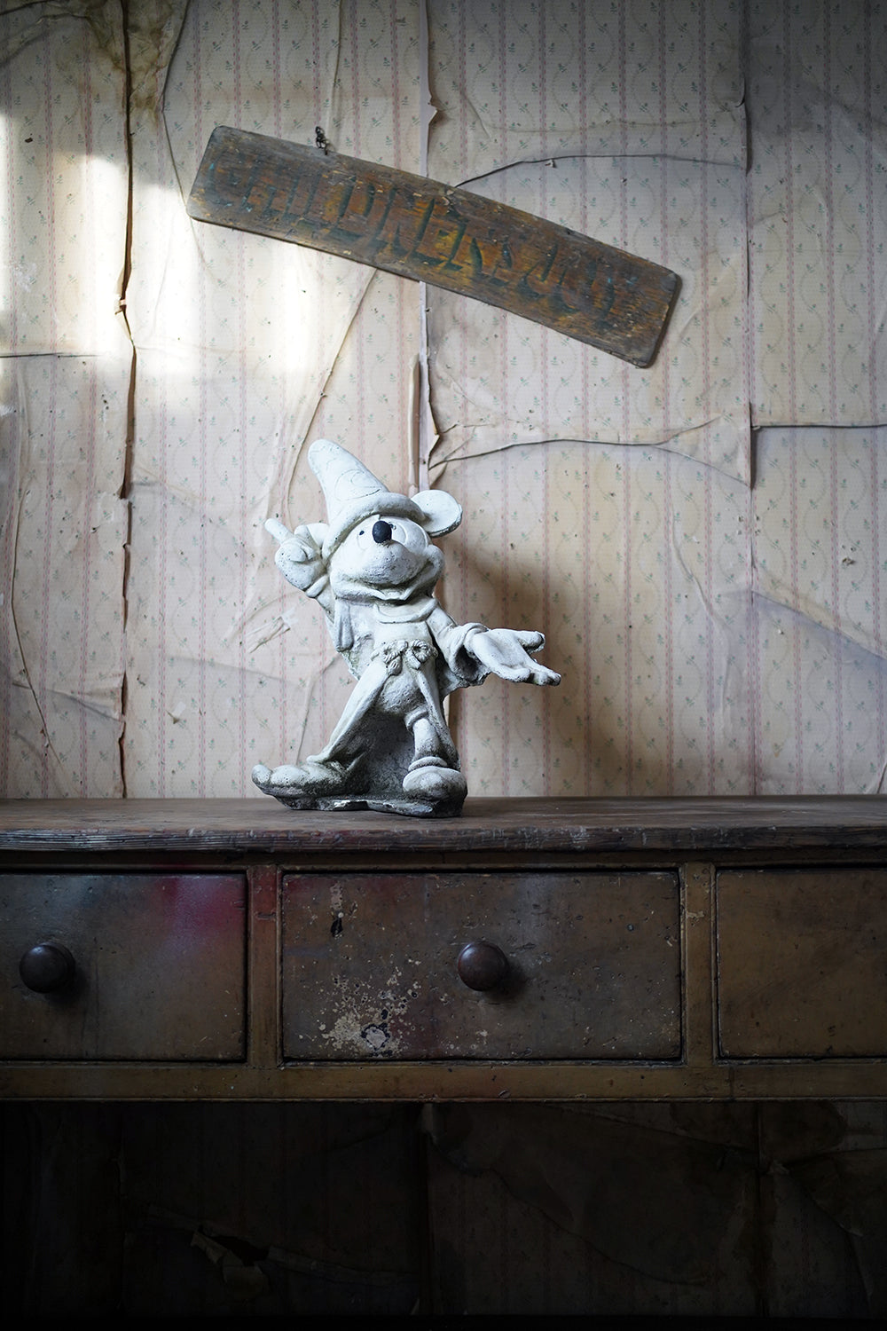 A 20thC Stone Figure of Mickey Mouse; The Sorcerer's Apprentice in Fantasia