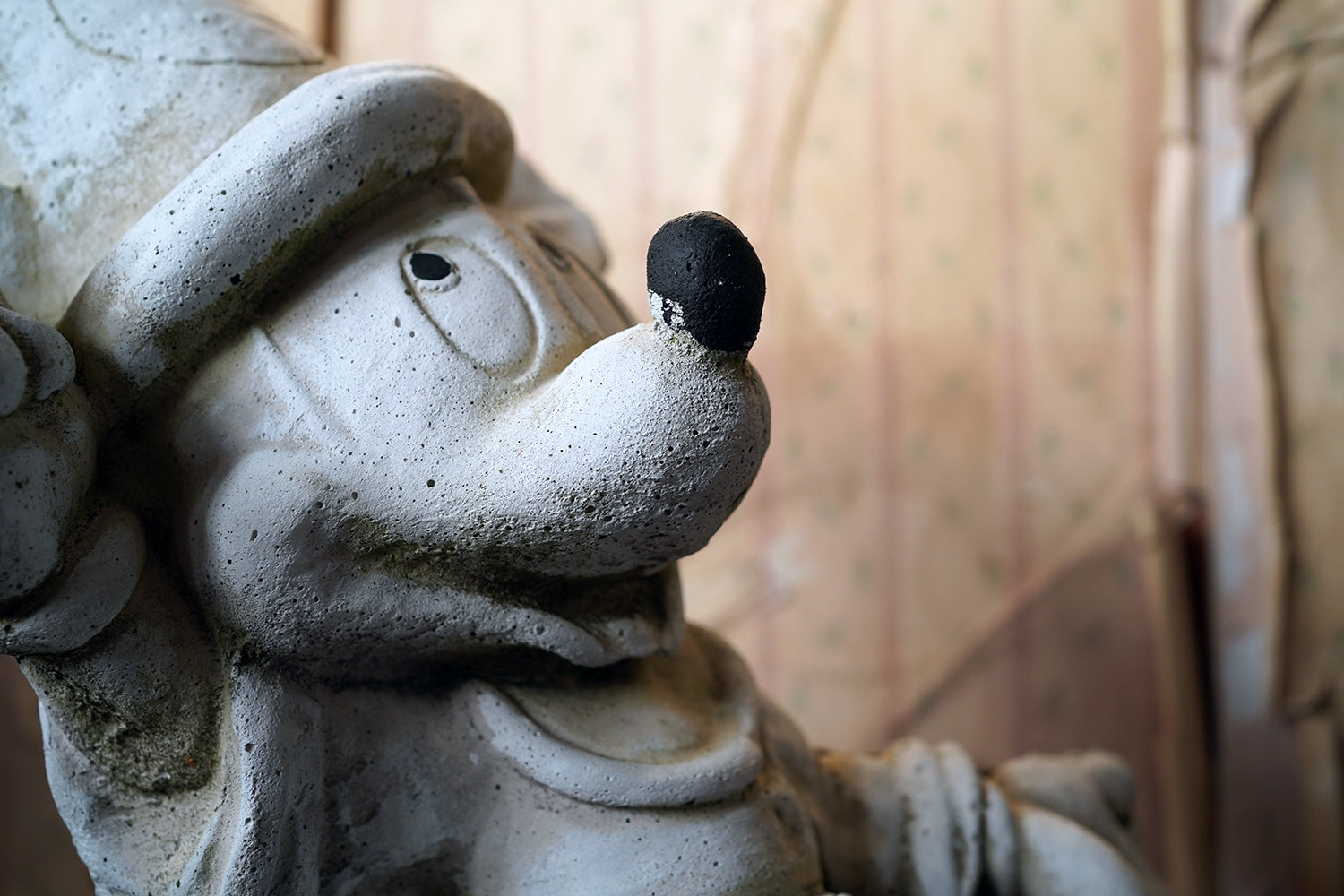 A 20thC Stone Figure of Mickey Mouse; The Sorcerer's Apprentice in Fantasia