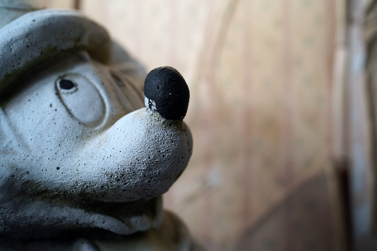 A 20thC Stone Figure of Mickey Mouse; The Sorcerer's Apprentice in Fantasia