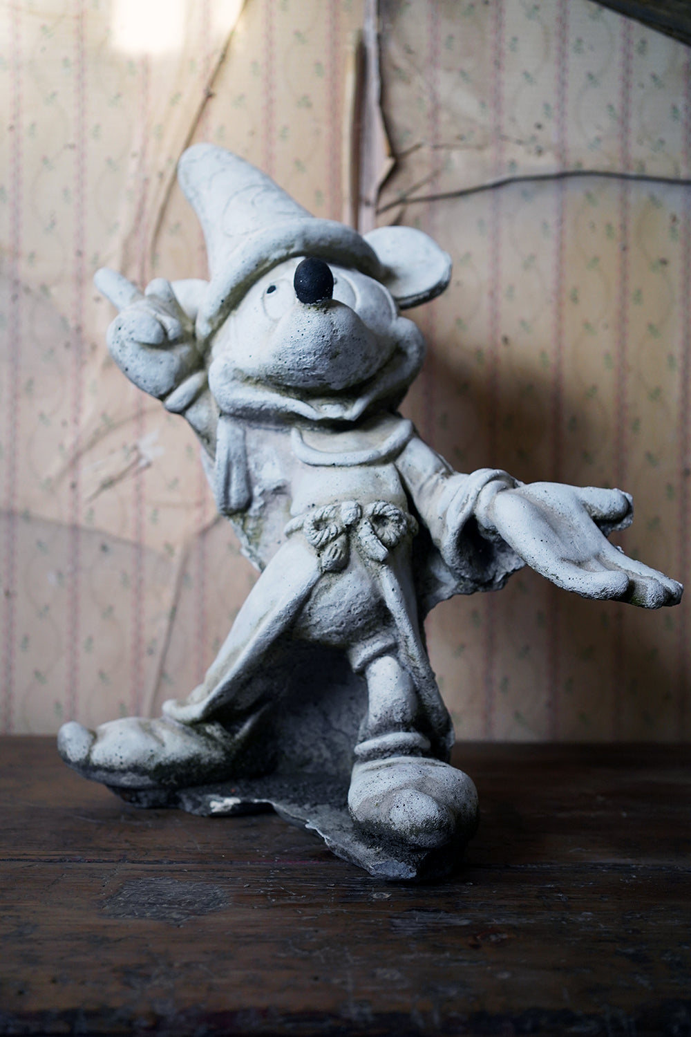 A 20thC Stone Figure of Mickey Mouse; The Sorcerer's Apprentice in Fantasia