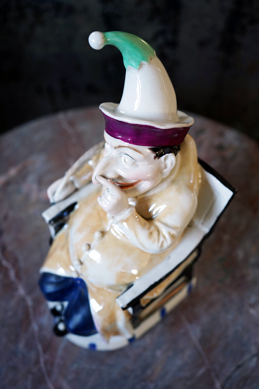 A 19thC Continental Hard Paste Porcelain Figural Lidded Jar as Mr Punch