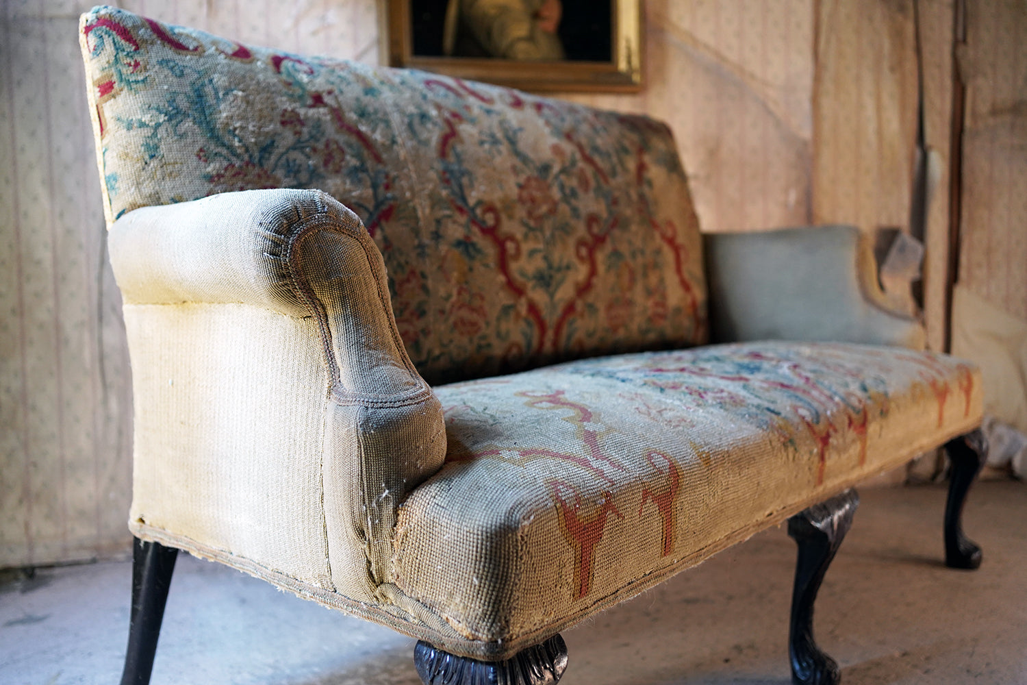 A George III Walnut Needlepoint Tapestry Upholstered Settee