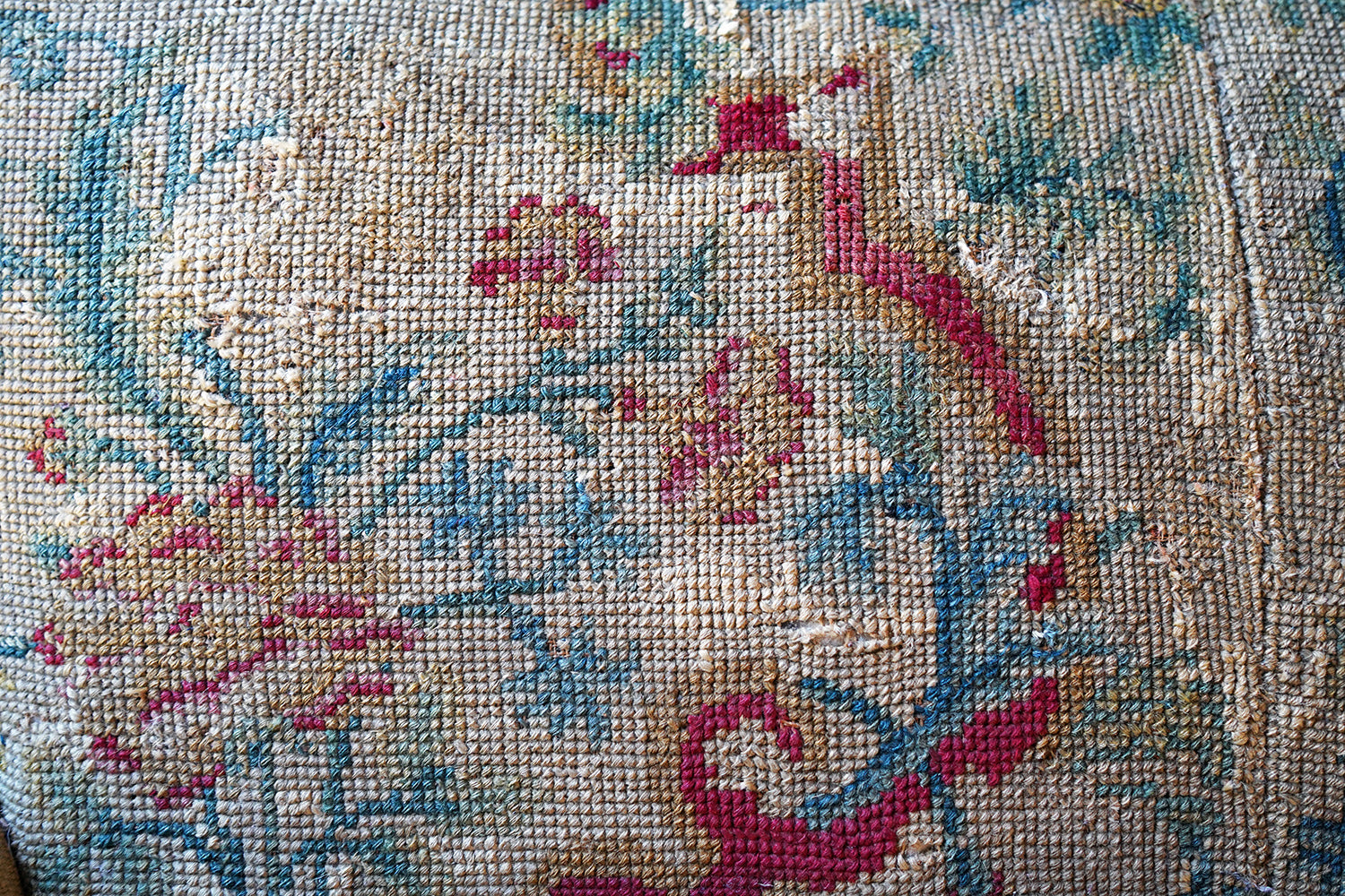 A George III Walnut Needlepoint Tapestry Upholstered Settee