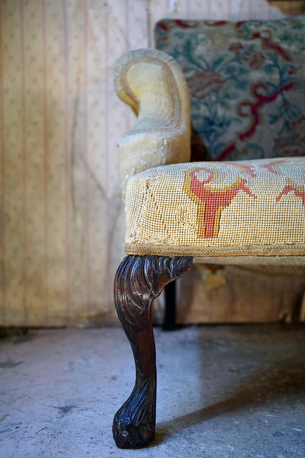 A George III Walnut Needlepoint Tapestry Upholstered Settee