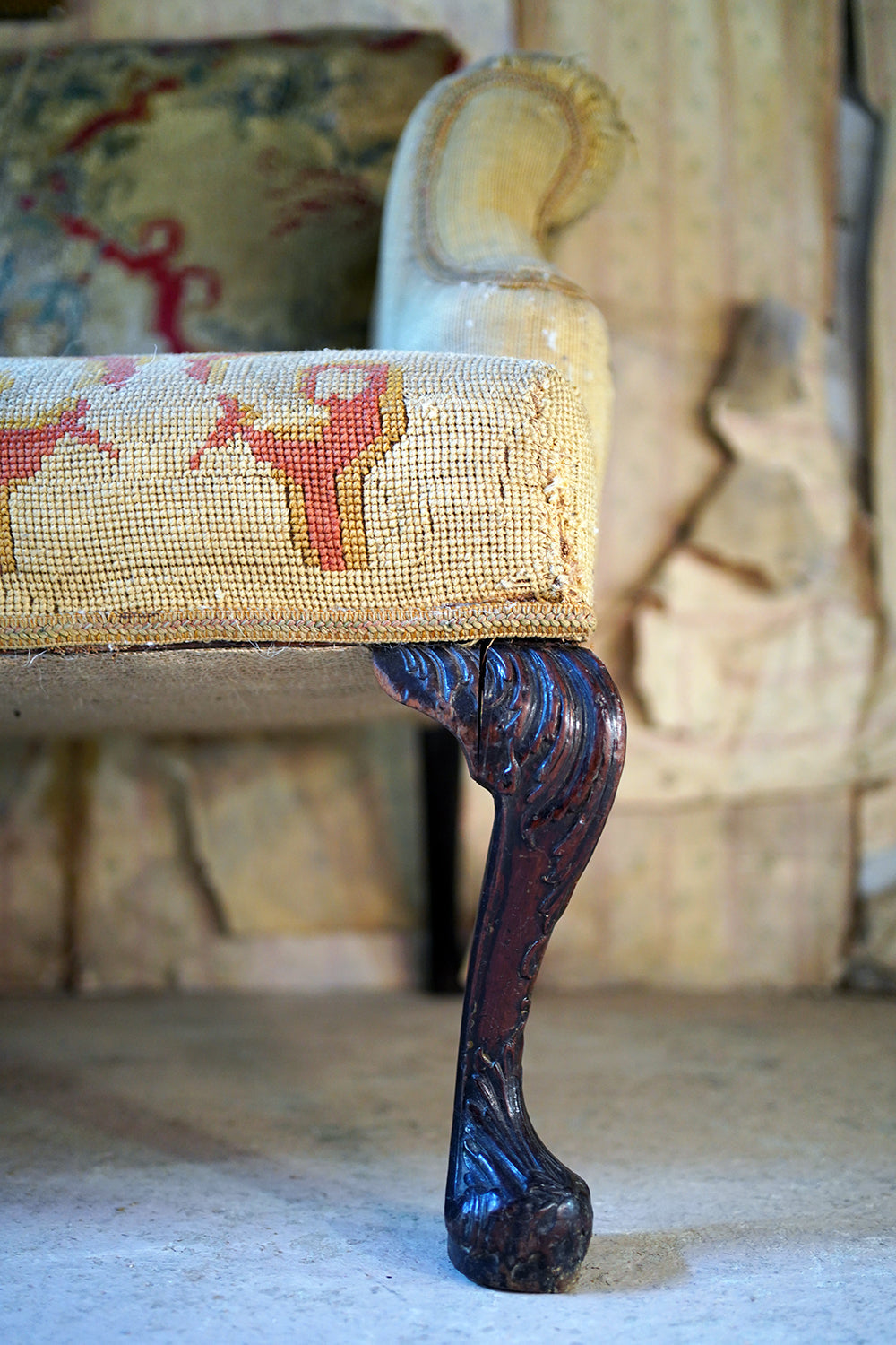 A George III Walnut Needlepoint Tapestry Upholstered Settee