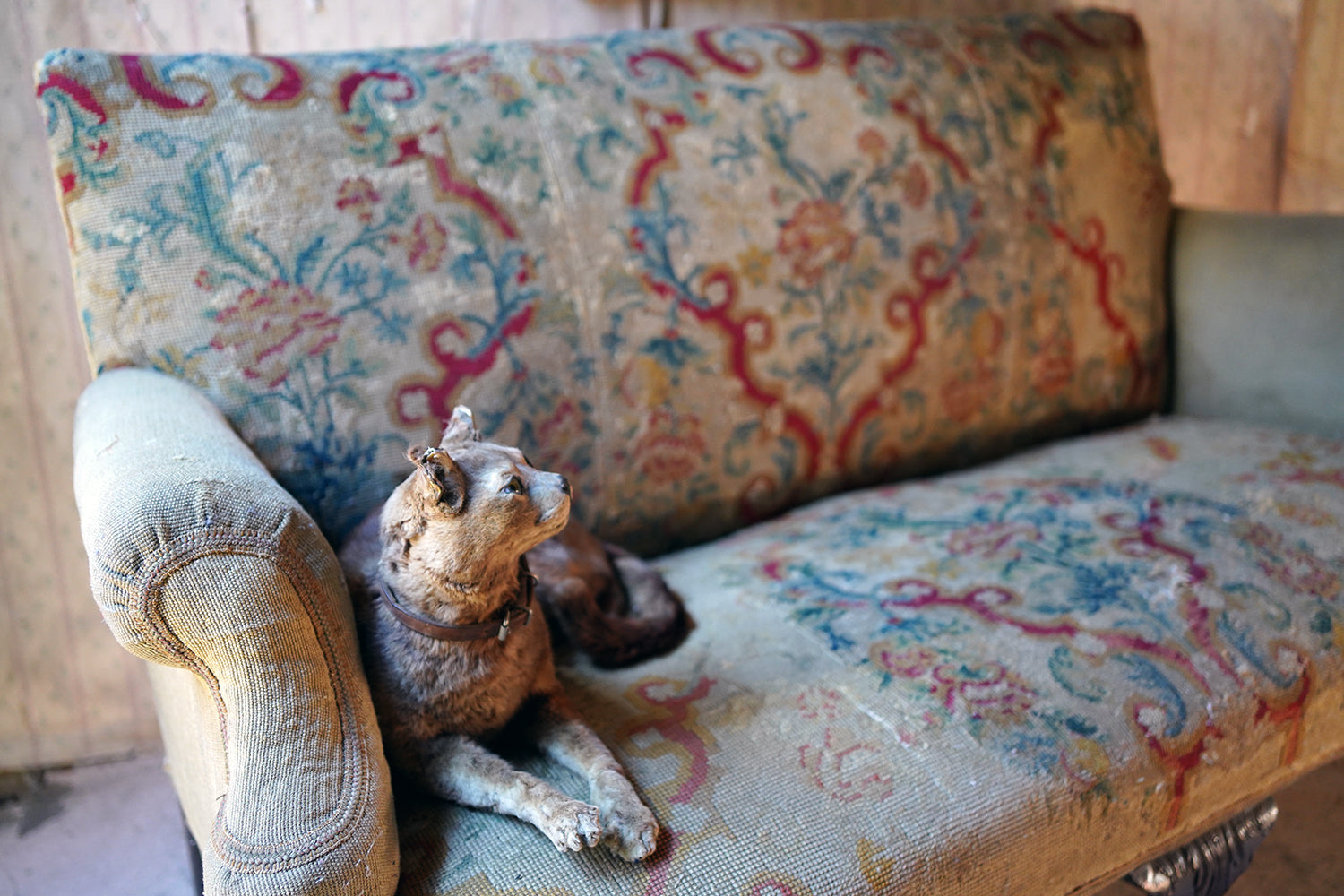A George III Walnut Needlepoint Tapestry Upholstered Settee