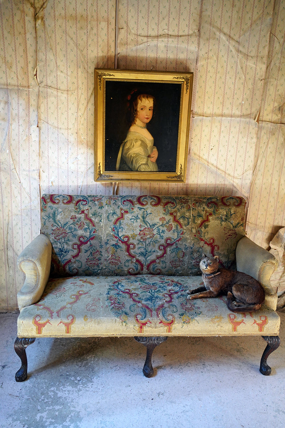 A George III Walnut Needlepoint Tapestry Upholstered Settee
