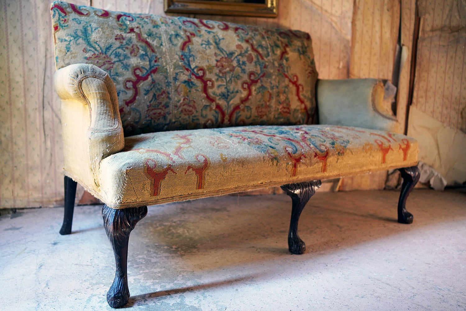 A George III Walnut Needlepoint Tapestry Upholstered Settee
