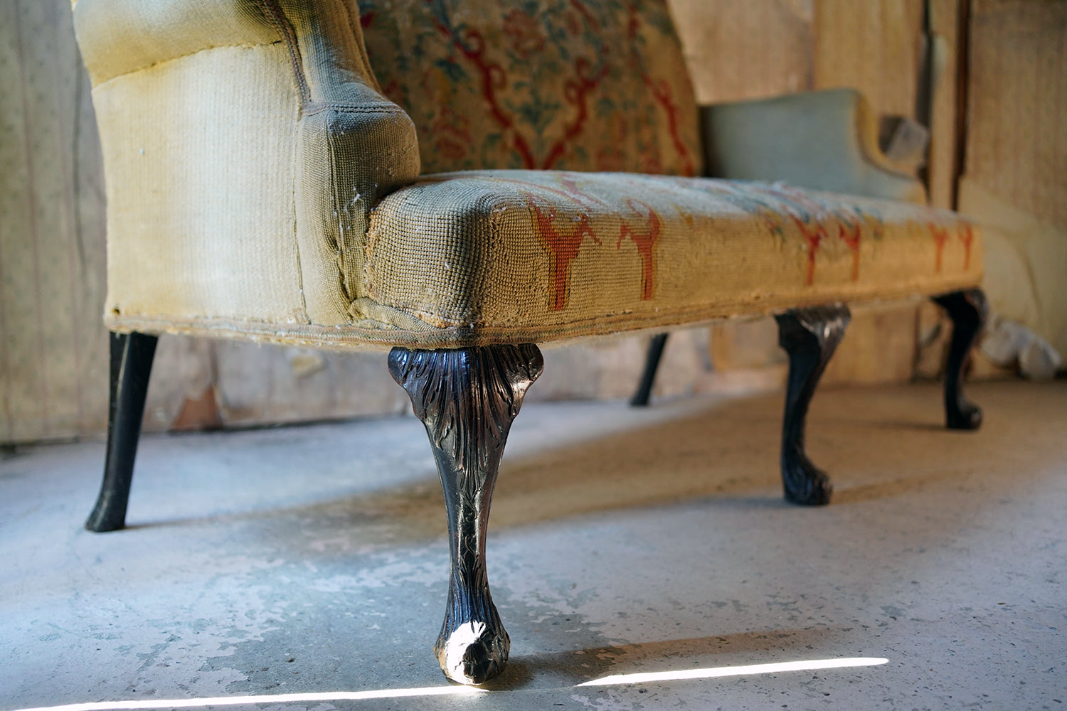 A George III Walnut Needlepoint Tapestry Upholstered Settee