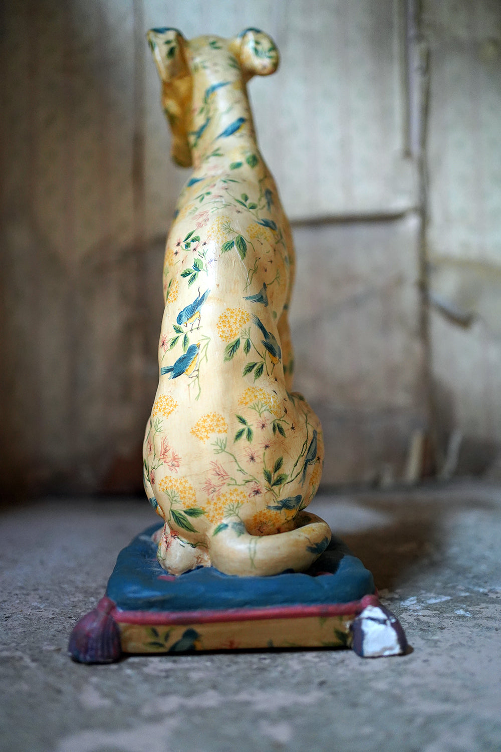 A 20thC Painted Plaster Model of a Hound