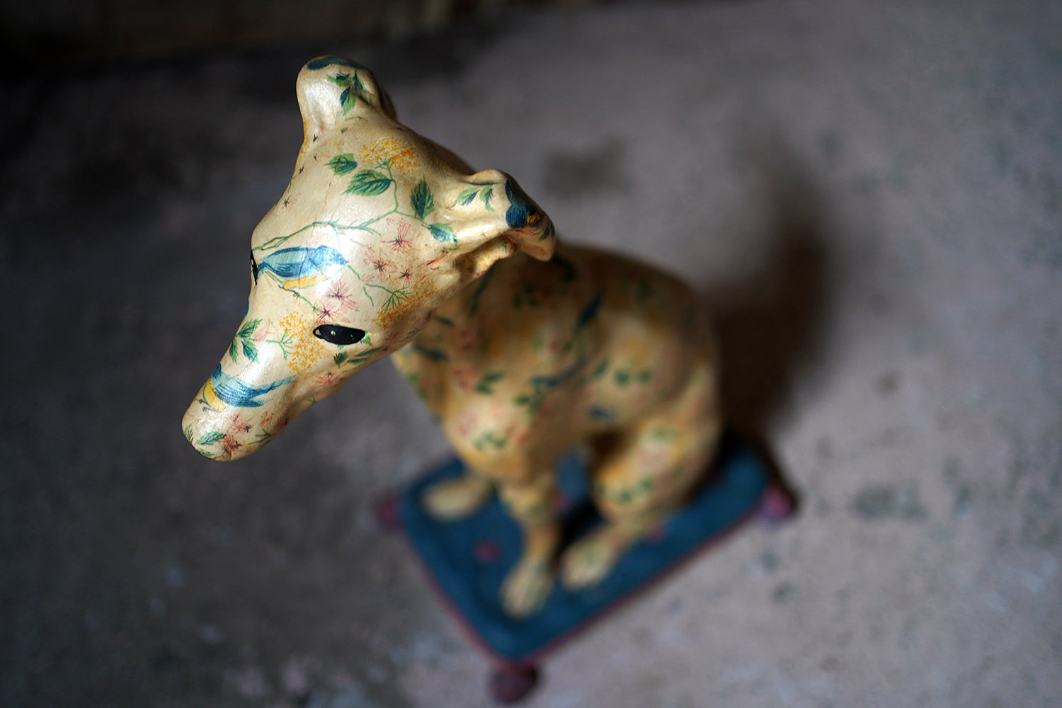 A 20thC Painted Plaster Model of a Hound