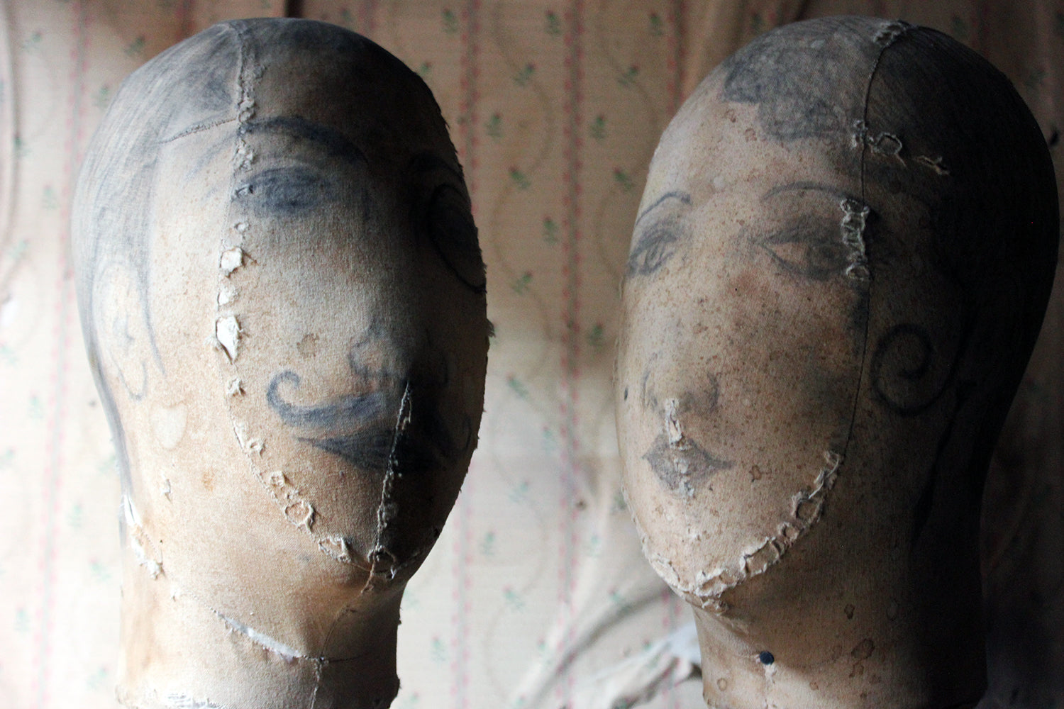 A Decorative Pair of Mannequin Shop Display Heads as a Flapper & Dandy