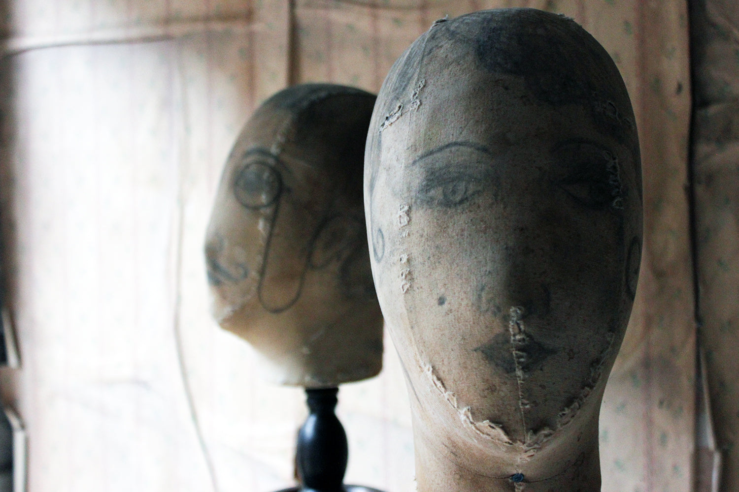 A Decorative Pair of Mannequin Shop Display Heads as a Flapper & Dandy