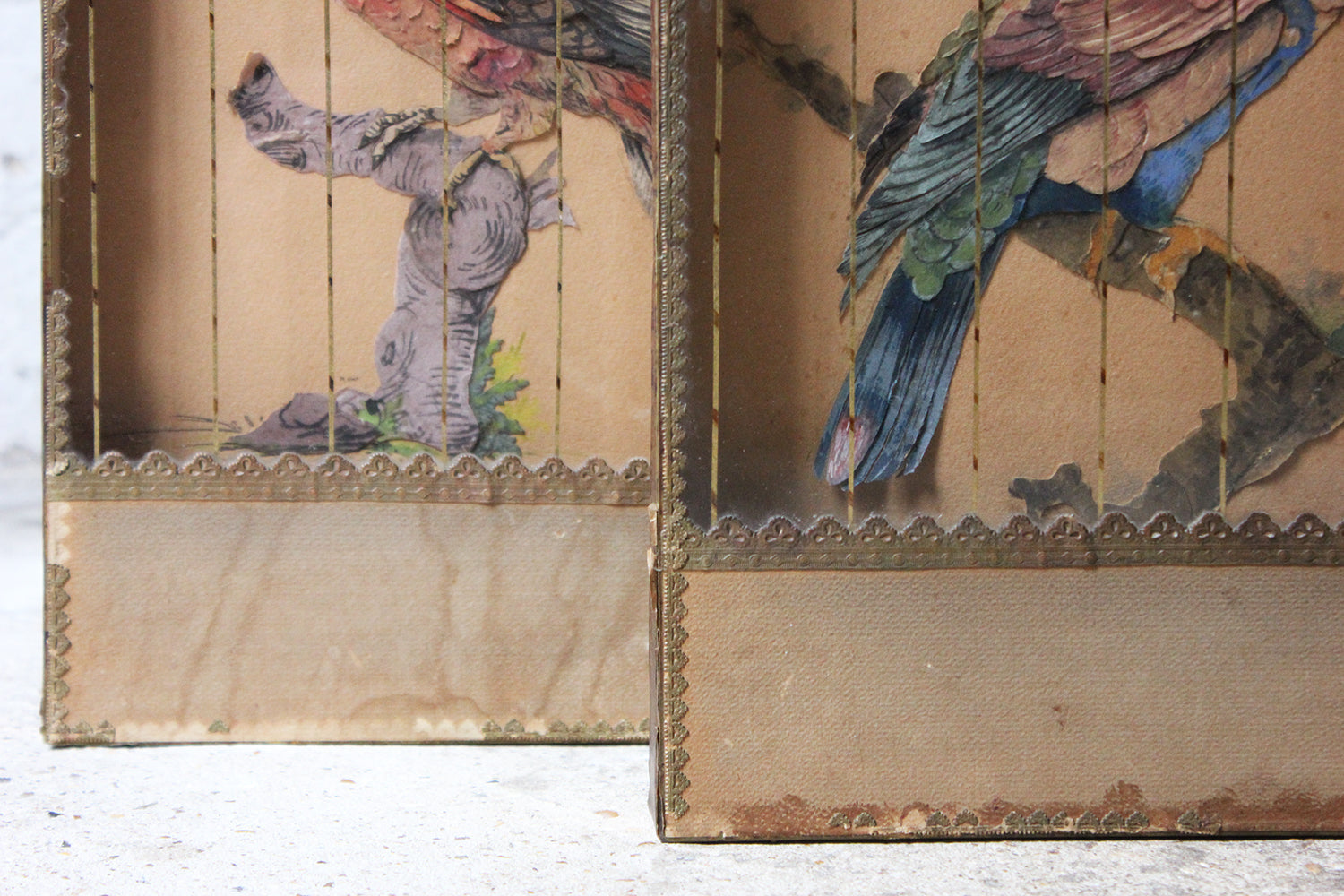 A Charming & Unusual Pair of Early 19thC Continental Appliqué Paper Pictures In The Form of Caged African Parrots c.1800-25