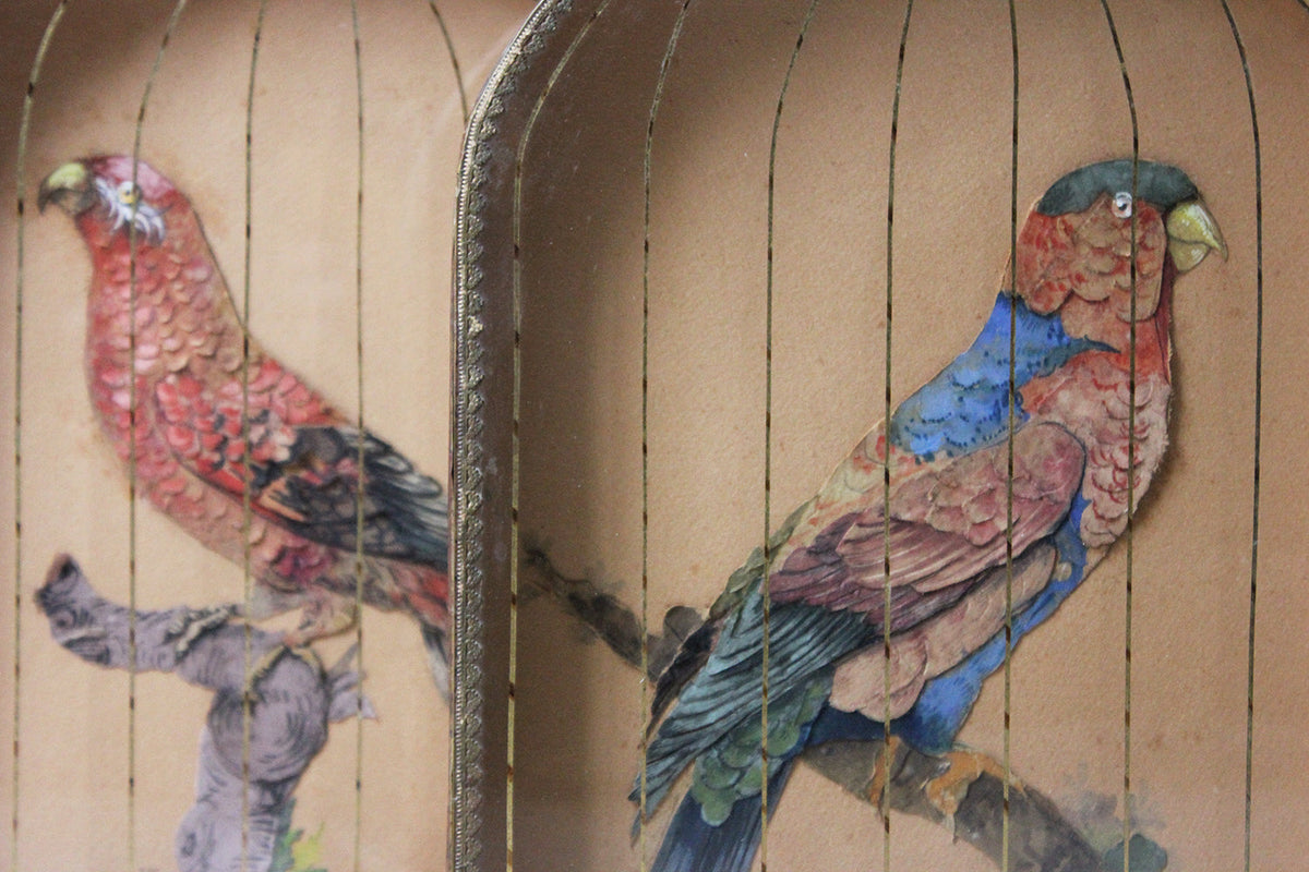 A Charming & Unusual Pair of Early 19thC Continental Appliqué Paper Pictures In The Form of Caged African Parrots c.1800-25