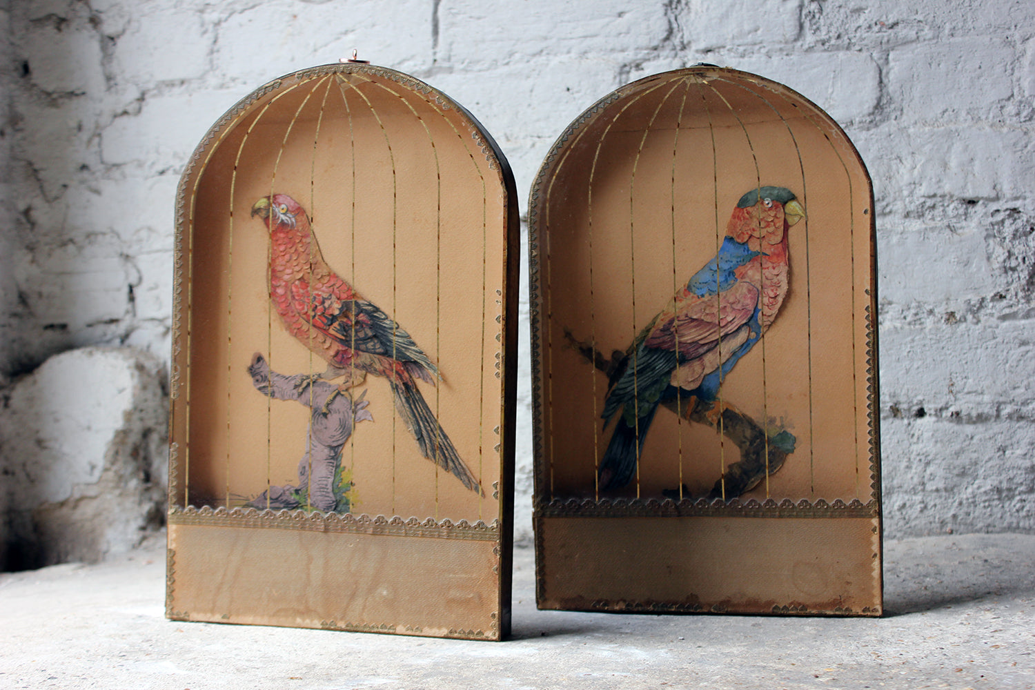 A Charming & Unusual Pair of Early 19thC Continental Appliqué Paper Pictures In The Form of Caged African Parrots c.1800-25