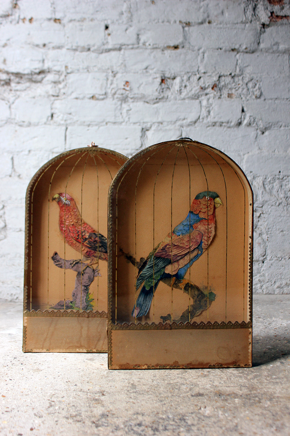 A Charming & Unusual Pair of Early 19thC Continental Appliqué Paper Pictures In The Form of Caged African Parrots c.1800-25