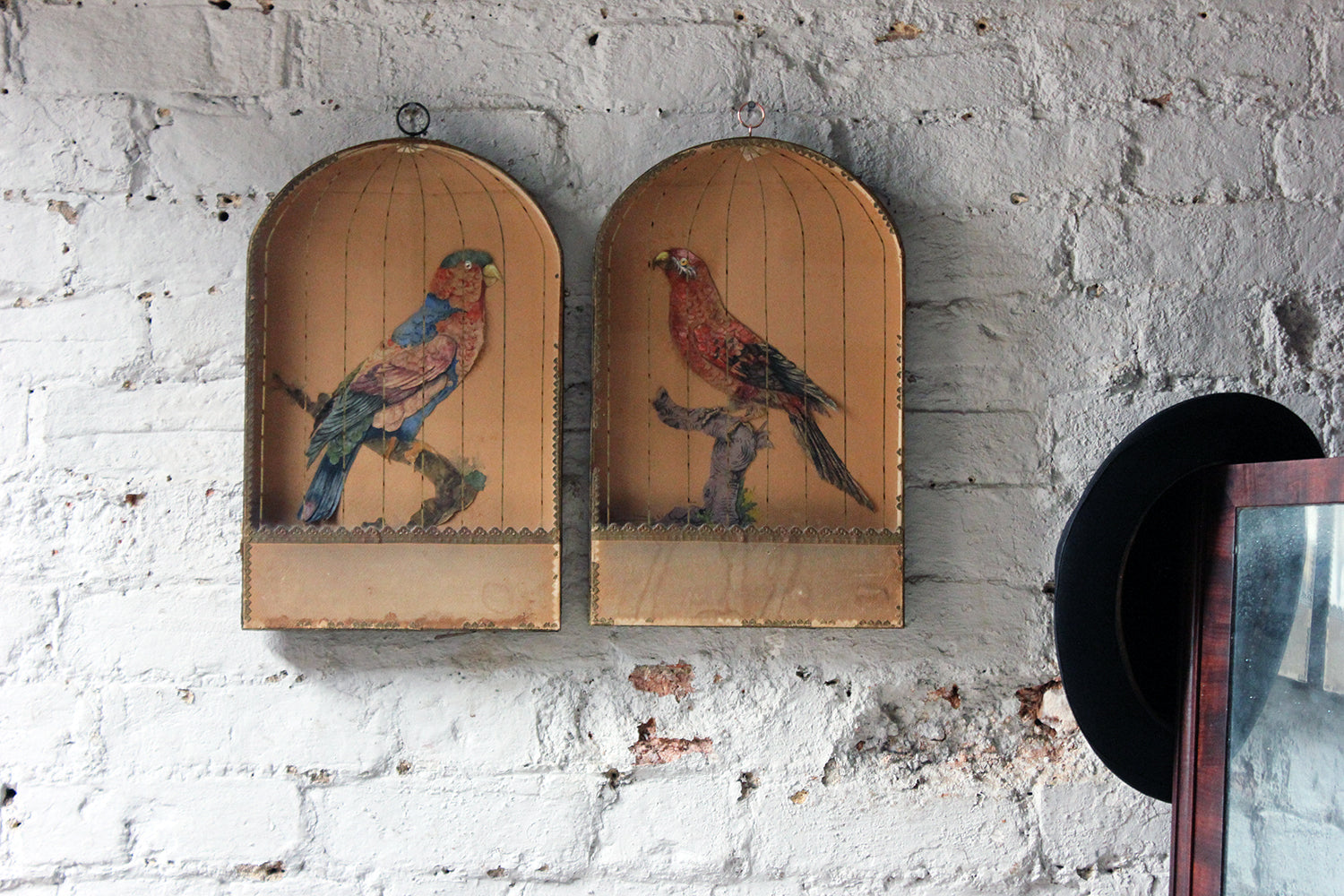 A Charming & Unusual Pair of Early 19thC Continental Appliqué Paper Pictures In The Form of Caged African Parrots c.1800-25