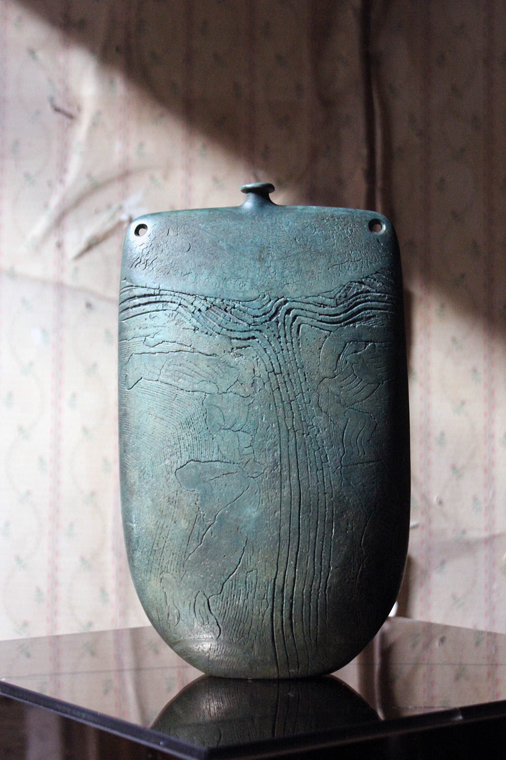 A Burnished Jade Green Bottle Vase by Peter Hayes c.1984