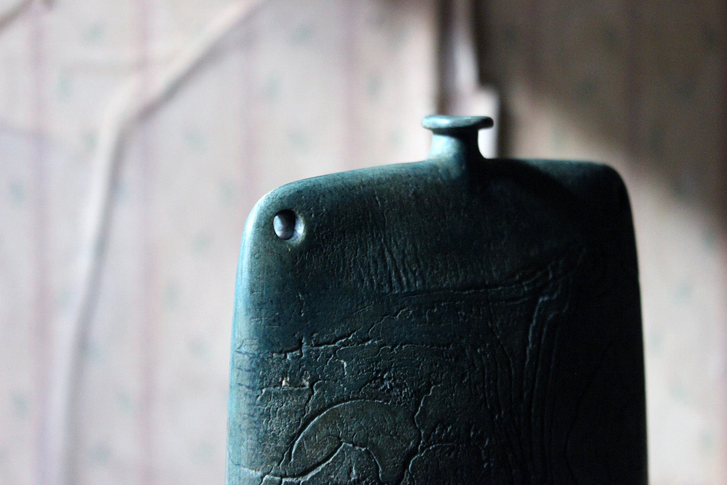 A Burnished Jade Green Bottle Vase by Peter Hayes c.1984