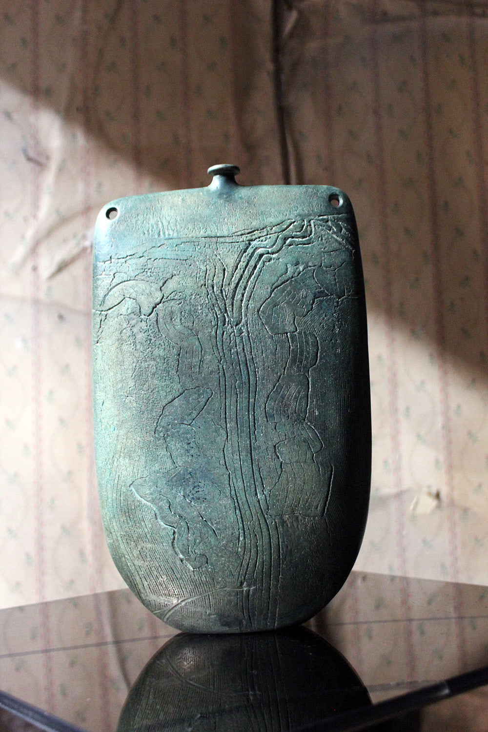 A Burnished Jade Green Bottle Vase by Peter Hayes c.1984