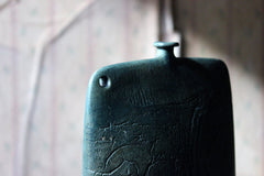 A Burnished Jade Green Bottle Vase by Peter Hayes c.1984