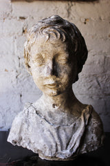 A Decorative 20thC Portrait Studio Plaster Bust of a Young Boy
