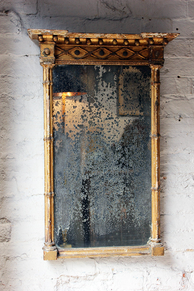 A Distressed Regency Period Giltwood Pier Mirror c.1820