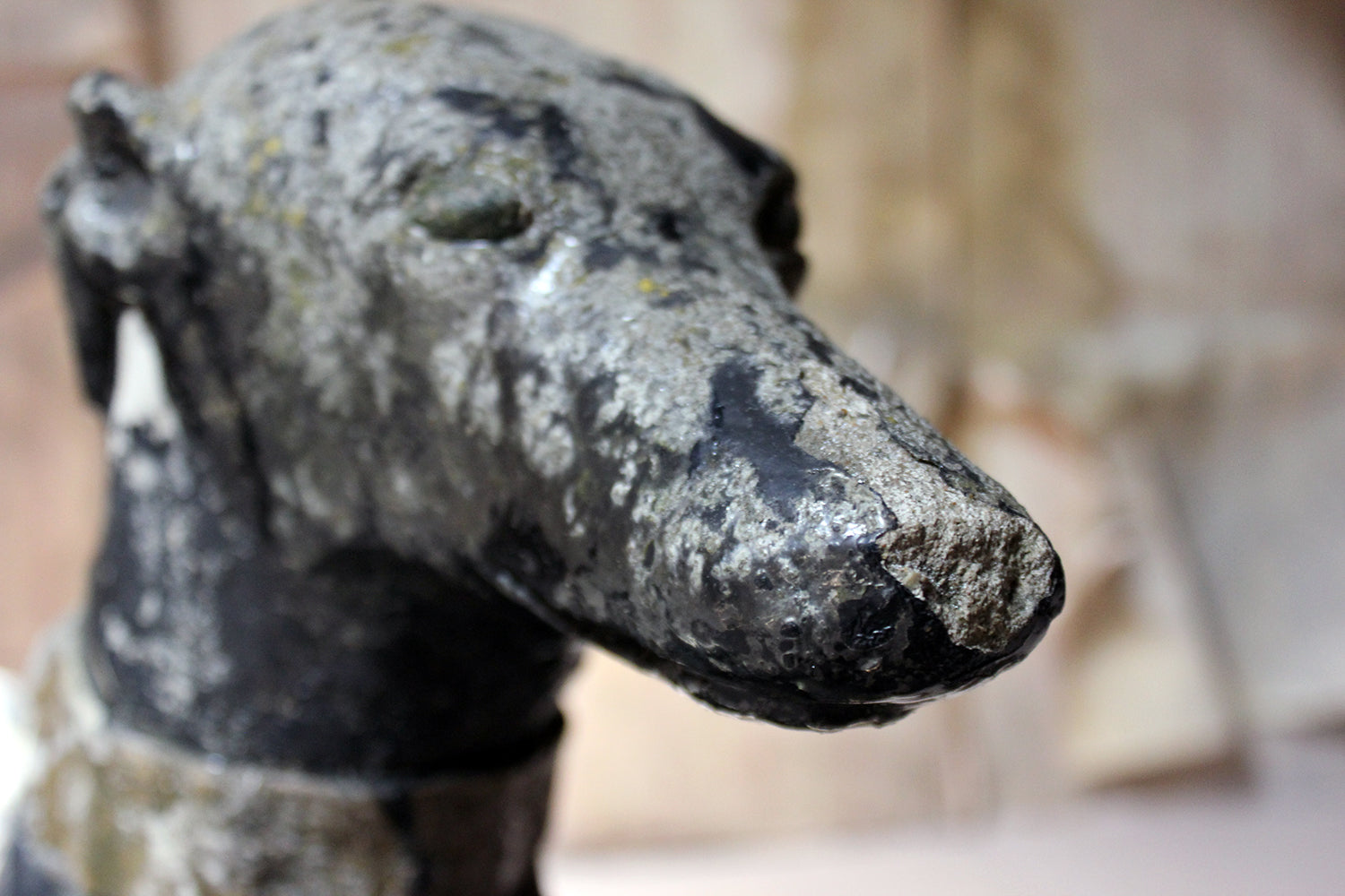 A Decorative Mid 20thC Painted Cast Stone Whippet c.1940-50