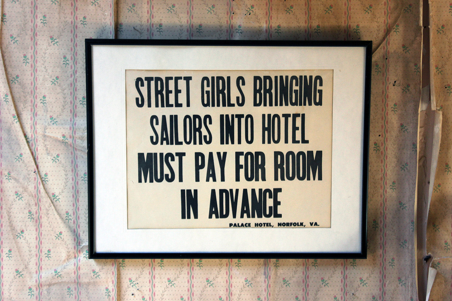 A Framed Printed Notice for The Palace Hotel, Virginia USA; Street Girls & Sailors c.1935-45