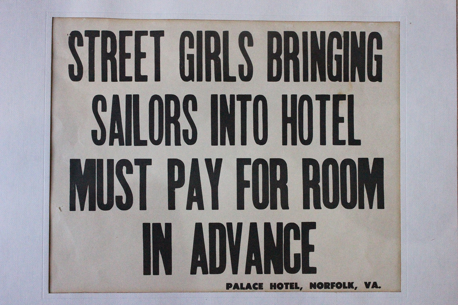 A Framed Printed Notice for The Palace Hotel, Virginia USA; Street Girls & Sailors c.1935-45
