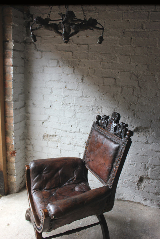 A Good 19thC Carved Oak & Leather Upholstered Savonarola Armchair