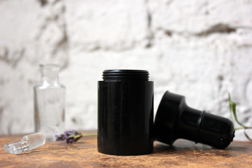 A Fine c.1910 Turned Ebony Perfume Holder & Bottle