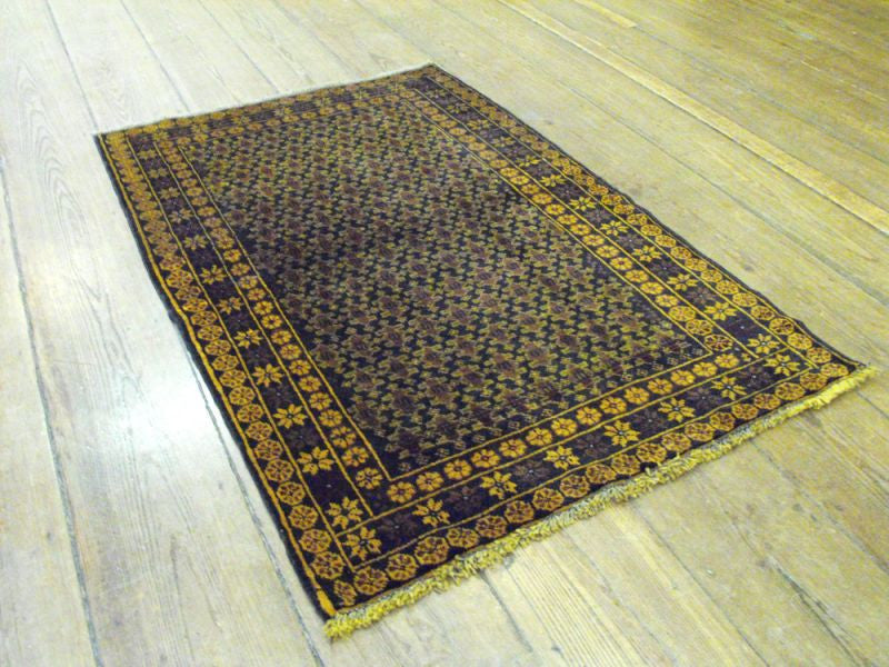 A Busy Herat Belouche Rug: 136cm x 87cm