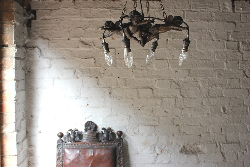 A Fabulous c.1890 Centre Light in the Form of Four Putti