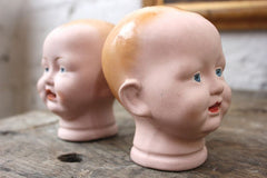 A Good Pair of Early 20thC Bisque Baby Doll Heads by The Diamond Pottery Co.