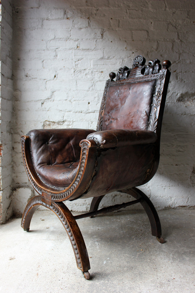 A Good 19thC Carved Oak & Leather Upholstered Savonarola Armchair